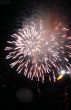 Night celebration fireworks upon dark sky