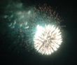 Night celebration fireworks upon dark sky