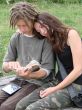 Young stydents reading in street