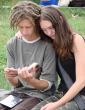 Young stydents reading in street