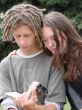 Young stydents reading in street