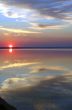 The sun, clouds and water