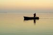 Lonely boat and beautiful sunrise