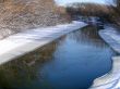 Winter snowy morning riverside