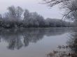 Spring snowy morning riverside