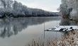 Spring snowy morning riverside