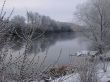 Spring snowy morning riverside