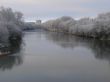Spring snowy morning riverside