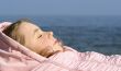 The girl has a rest near the sea
