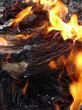 Flame of burning paper sheet stack