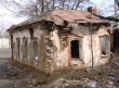 Burned abandoned wintage town building