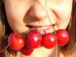 The girl with a sweet cherry