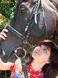 Brunette female model with horse