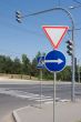 Road signs, traffic lights and pedestrian crossing