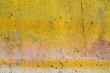 Grunge yellow painted wall