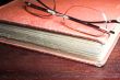 old book and glasses