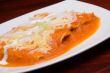 Tacos with red sauce. Close-up