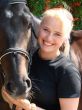 Blond Female Model with Dark Horse