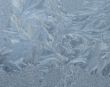 Hoarfrost on window glass in frosty weather