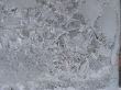 Hoarfrost on window glass in frosty weather