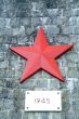 Monument with red star