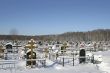 snow-clad graveyard in winter