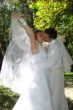 Wedding Kiss of Young Just Married Couple
