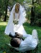 Groom Photographing His Bride
