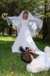 Groom Photographing His Bride