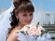Smiling Bride With Wedding Rose Bouquet