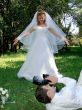 Groom Photographing His Bride