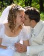 Wedding Kiss of Young Just Married Couple