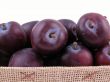 basket full of fresh plums