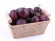 basket full of fresh plums