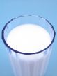 milk on blue background
