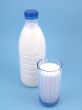 milk on blue background
