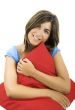 Beautiful woman with a soft cushion