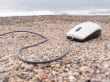 The computer mouse on a sea coast