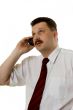 The man speaking by phone on a white background