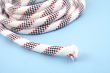 white rope isolated on blue close-ups