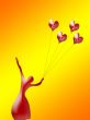 Silhouette of the ballerina with balloons heart