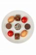 Chocolates on a white plate
