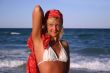 Blonde in red headscarf