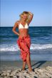 beautiful blonde in red skirt on the beach
