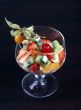 fruit salad in tall wine glass