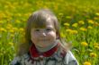 Smiling in dandelions