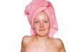 Smiling calm girl in towel