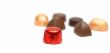 Fancy chocolates over white background