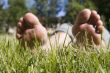 feet in grass