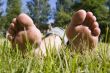 feet in grass